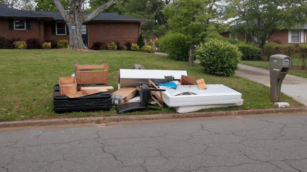 Professional delivery truck performing removal for recycling and eco-friendly junk pickup service.